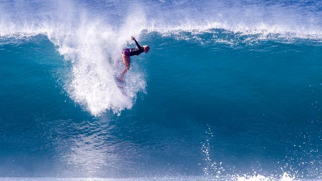 Bethany Hamilton surfing Pipeline at four months pregnant and winning the Pipeline Women’s Pro. Picture: Brian Bielmann