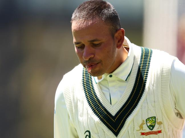 ADELAIDE, AUSTRALIA - JANUARY 19: Usman Khawaja of Australia leaves the field retiring hurt after he was struck while batting during day three of the Mens Test match series between Australia and West Indies at Adelaide Oval on January 19, 2024 in Adelaide, Australia. (Photo by Paul Kane/Getty Images)