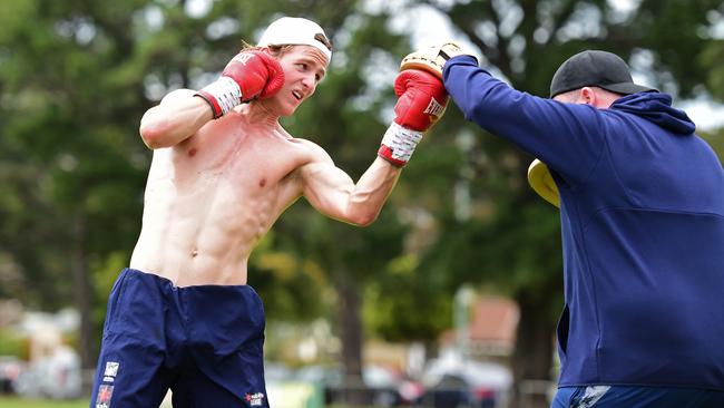 Cooper Stephens sparring with Matt Critchley at Highton Reserve. Picture: Stephen Harman