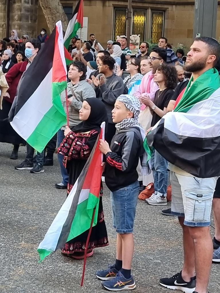 Men, women and children gathered outside Town Hall for the start of the protest. Picture: News.com.au / Jasmine Kazlauskas