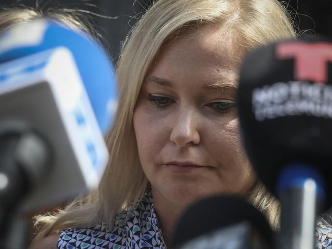 In this Aug. 27, 2019, photo, Virginia Roberts Giuffre, who says she was trafficked by sex offender Jeffrey Epstein, holds a news conference outside a Manhattan court where sexual assault claimants invited by a judge addressed a hearing following Epstein's jailhouse death in New York. Prince Andrew suffered fresh scrutiny Monday night, Dec. 2, when the woman who says she was a trafficking victim made to have sex with him when she was 17 asked the British public to support her quest for justice. (AP Photo/Bebeto Matthews)