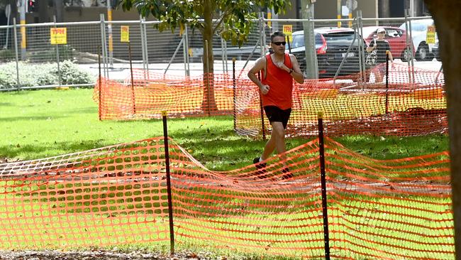 A jogger runs through a taped-off Victoria Park on February 17, 2024. Picture: NCA NewsWire / Jeremy Piper