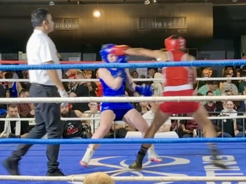 Monique Barker lands a hit on her opponent at Golden Gloves