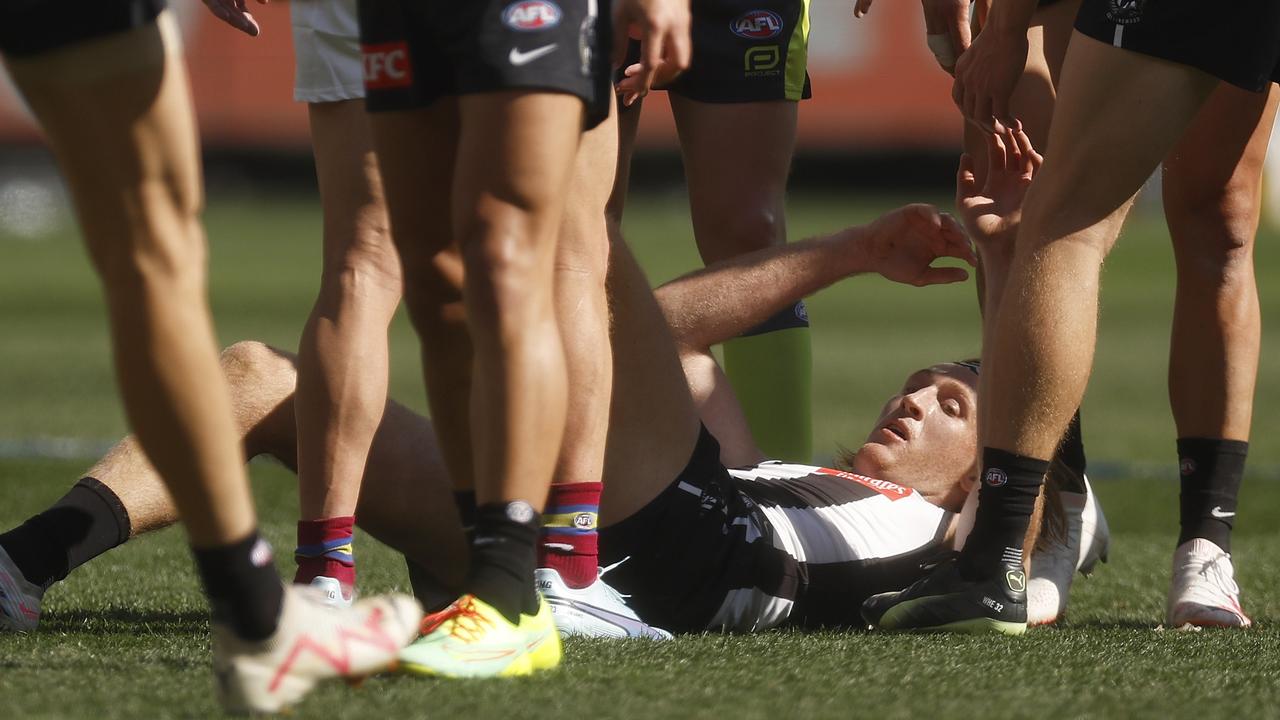 Nathan Murphy hits the deck after his latest concussion in the grand final. Picture: Getty Images