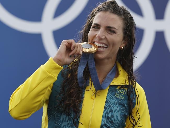 NCA. PARIS FRANCE. 2024 OLYMPIC GAMES. July 28 - Day2 Ã WomenÃs Kayak final at Vaires-sur-Marne Nautical Stadium .   Australias Jess Fox bites her gold medal on the podium . Pic: Michael Klein