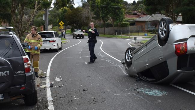 A car flipped in Croydon Hills Drive this afternoon. Picture: Victoria Police.