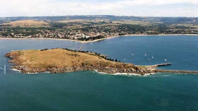 An aerial view of Granite Island, with mainland Victor Harbor in the background.