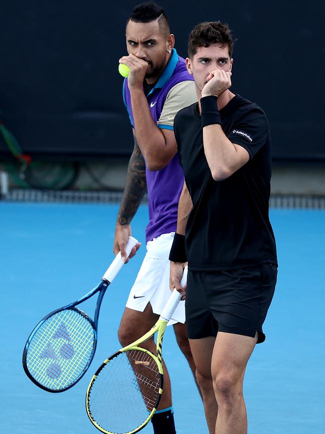 Nick Kyrgios and Thanasi Kokkinakis talk tactics on Saturday. Picture: Getty Images