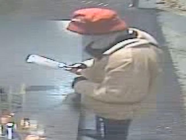 Watch: Thief storms store armed with meat cleaver