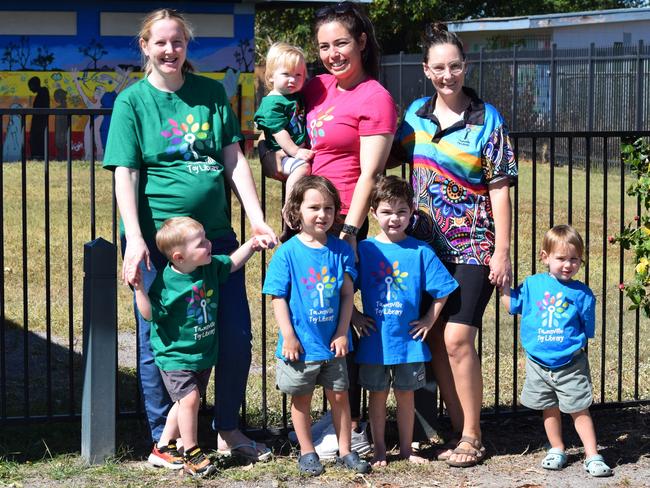 Michaela Wenman with Finn, Marion Mackenzie with Leo and Arlie and Stacey Prenter with Lachlan and William in front of the newly repaired fence.