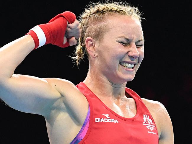 Anja Stridsman of Australia reacts after defeating Paige Murney of England in the Womens 60kg Boxing Final on day ten of competition at the XXI Commonwealth Games at the Oxenford Studios on the Gold Coast, Australia, Saturday, April 14, 2018. (AAP Image/Dave Hunt) NO ARCHIVING, EDITORIAL USE ONLY