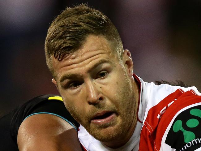 Dragon's Trent Merrin  wrapped up by the defense  during the NRL game between the St George Illawarra Dragons and the Penrith Panthers at Win Stadium Wollongong .Picture Gregg Porteous