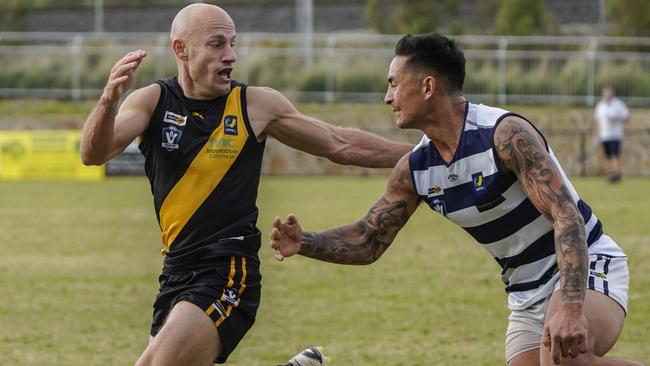 MPNFL: Seaford’s Damien Rayson tries to evade his opponent. Picture: Valeriu Campan