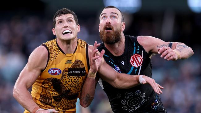 ADELAIDE, AUSTRALIA - MAY 19: Lloyd Meek of the Hawks competes with Charlie Dixon of the Power during the 2024 AFL Round 10 match between Yartapuulti (Port Adelaide Power) and the Hawthorn Hawks at Adelaide Oval on May 19, 2024 in Adelaide, Australia. (Photo by James Elsby/AFL Photos via Getty Images)