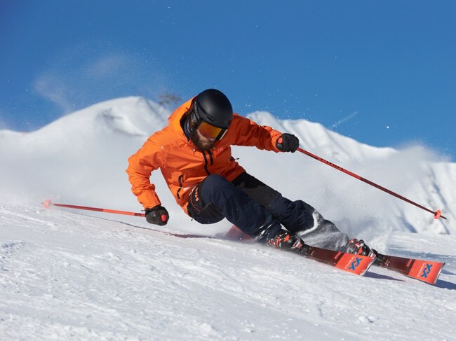 A skier slaying it with Volkl’s Deacon 80 skis.