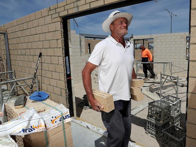 17/10/2019Homegroup tradies John Inwards (closest) and Perry Albon at LendLease's coastal subdivision north of Perth, Alkimos Beach.Pic Colin Murty The Australian