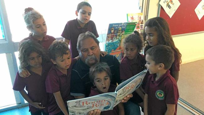 CLOSING THE GAP: Cherbourg teacher Bevan Costello with his students.