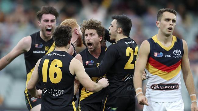 Matthew Snook celebrates a last-term goal as Lachlan Sholl walks off. Picture SARAH REED