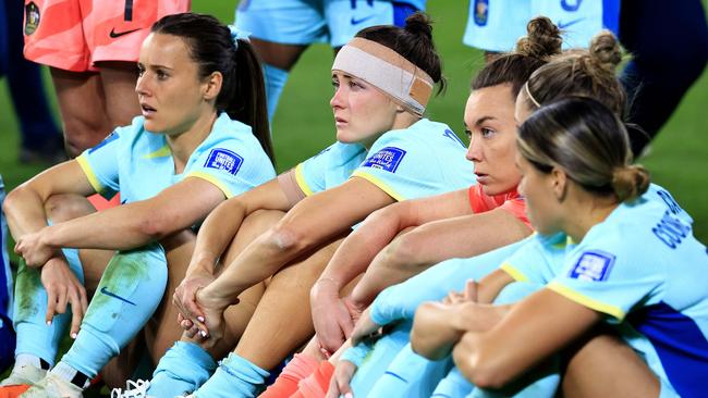 The Matildas look dejected post game. Picture: Adam Head