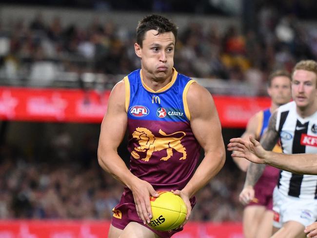 BRISBANE, AUSTRALIA - MARCH 28: Hugh McCluggage of the Lions competes for the ballduring the round 3 AFL match between the Brisbane Lions and Collingwood Magpies at The Gabba, on March 28, 2024, in Brisbane, Australia. (Photo by Matt Roberts/AFL Photos/Getty Images)