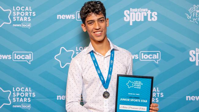 Aiden Princena-White with his award at Bankstown Sports Club.