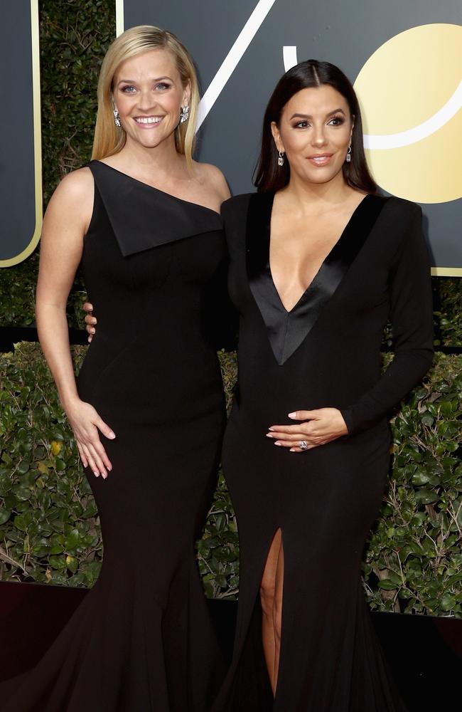 Reese Witherspoon and Eva Longoria attends The 75th Annual Golden Globe Awards at The Beverly Hilton Hotel on January 7, 2018 in Beverly Hills, California. Picture: Getty