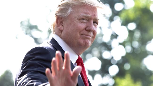 US President Donald Trump waves as he walks out from the White House in Washington. Picture: AFP Photo/Yuri Gripas