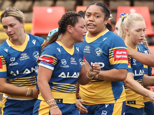 NEWCASTLE, AUSTRALIA - FEBRUARY 27: Tiana Penitani of the Eels celebrates scoring a try with teammates during the round one NRLW match between the Newcastle Knights and the Parramatta Eels at McDonald Jones Stadium, on February 27, 2022, in Newcastle, Australia. (Photo by Ashley Feder/Getty Images)