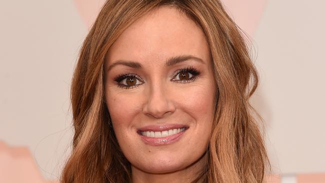 Early arrival ... TV personality Catt Sadler graces the Academy Awards red carpet. Picture: Getty Images