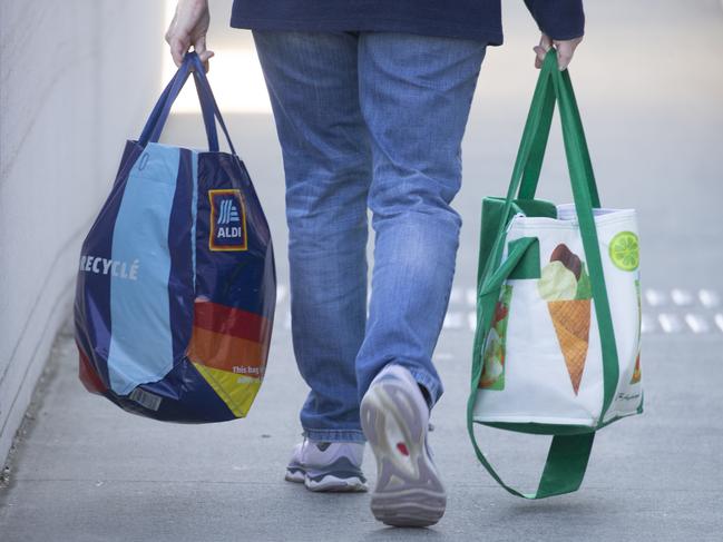BRISBANE, AUSTRALIA - NewsWire Photos - JUNE 19, 2024: Generic photo of Australian shopping centre ALDI and Woolworths bags.Picture: NewsWire / Glenn Campbell