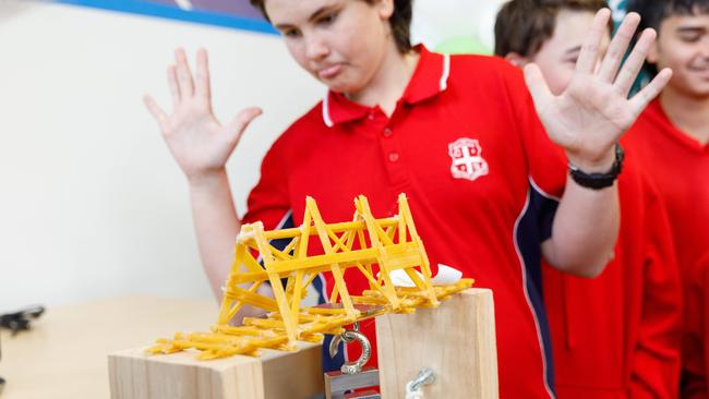 Here, students from Walcha Central School set up their bridge for the load test. Picture by Max Mason-Hubers