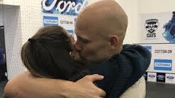 Jordan and Gary Ablett in the changeroom after a match.