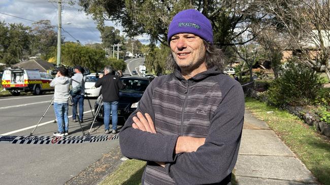 Neighbour Damien Dubois wrapped the kids in blanket as they emerged from the burning house.