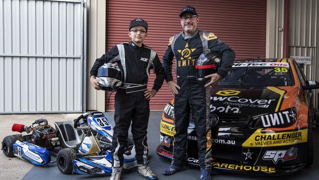 Jason Gomersall at Matt Stone Racing with son Ben, 13, and his "Arrow" go-kart. Picture: Mark Cranitch