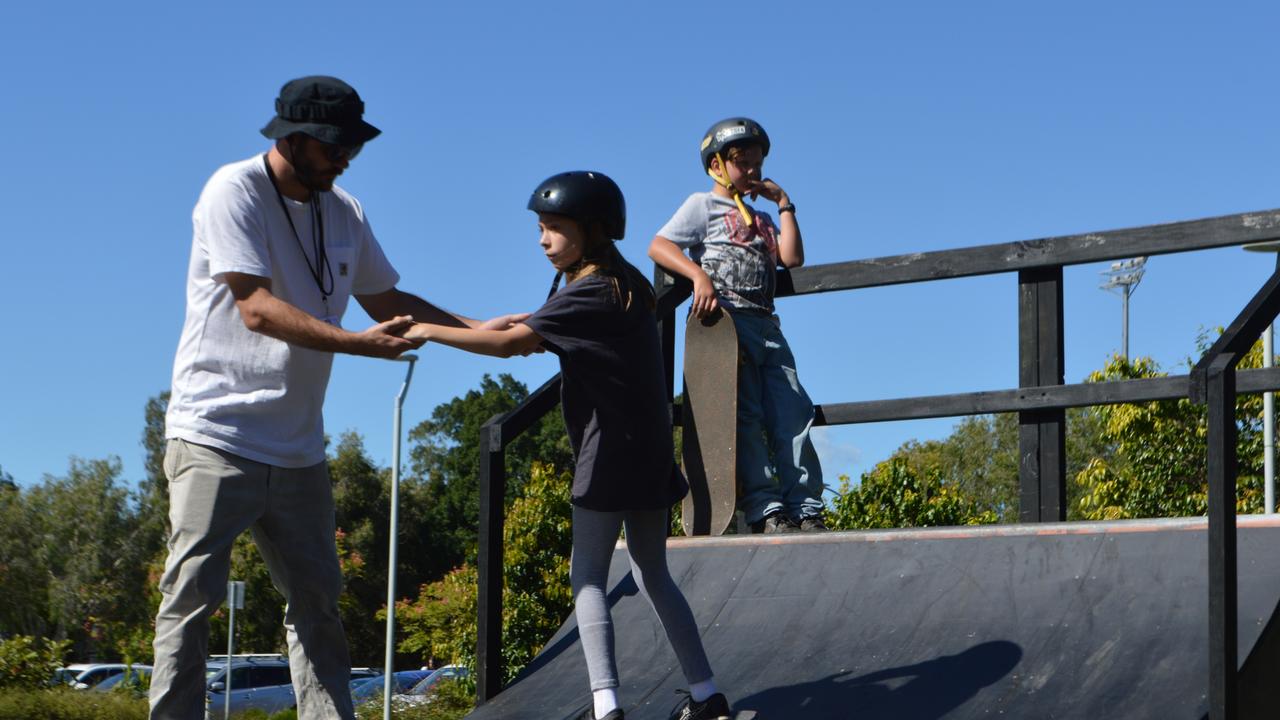 Young skaters take on the half pipe at the Lismore Quad.