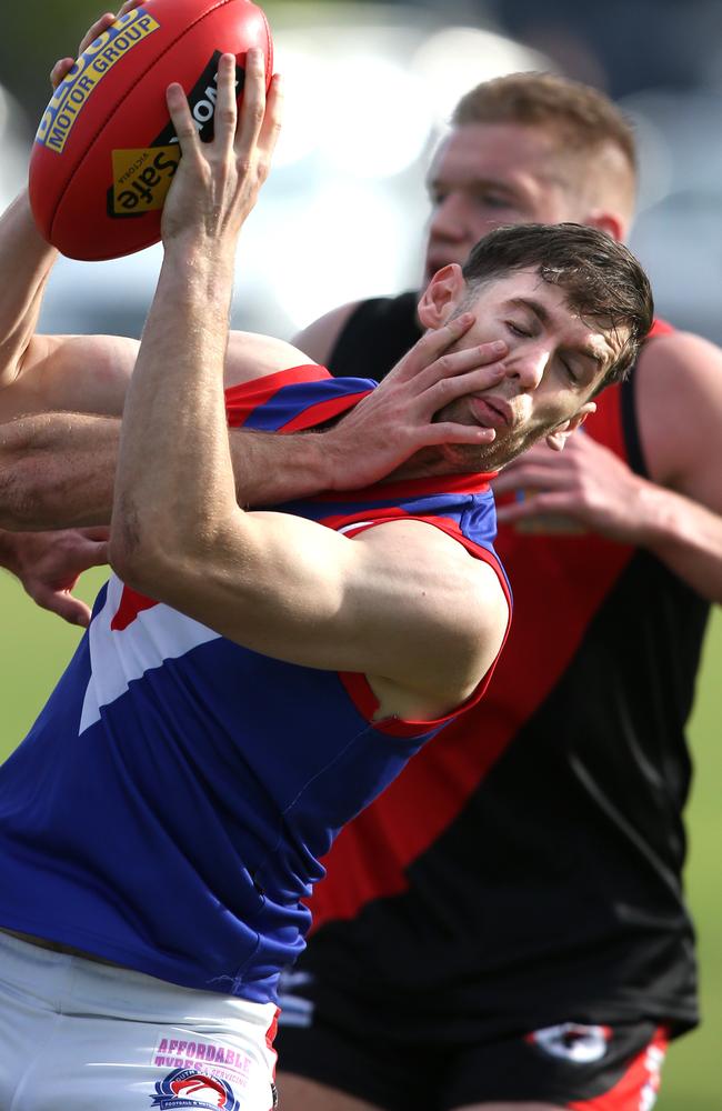 South Barwon's Jack Driver marks under pressure. Picture: Mike Dugdale