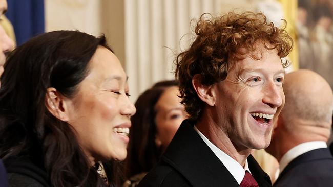 WASHINGTON, DC - JANUARY 20: Meta and Facebook CEO Mark Zuckerberg (C) and his wife Priscilla Chan (L) arrive to the inauguration of U.S. President-elect Donald Trump in the Rotunda of the U.S. Capitol on January 20, 2025 in Washington, DC. Donald Trump takes office for his second term as the 47th president of the United States. (Photo by Chip Somodevilla/Getty Images)