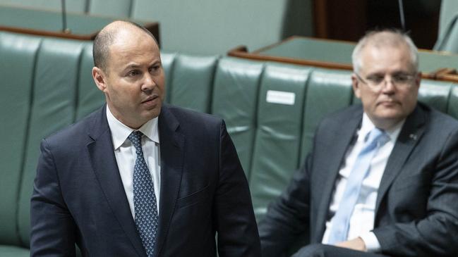 Prime Minister Scott Morrison (right) with Treasurer Josh Frydenberg in parliament. The government will be facing increasing calls for industry support packages. Picture: Gary Ramage