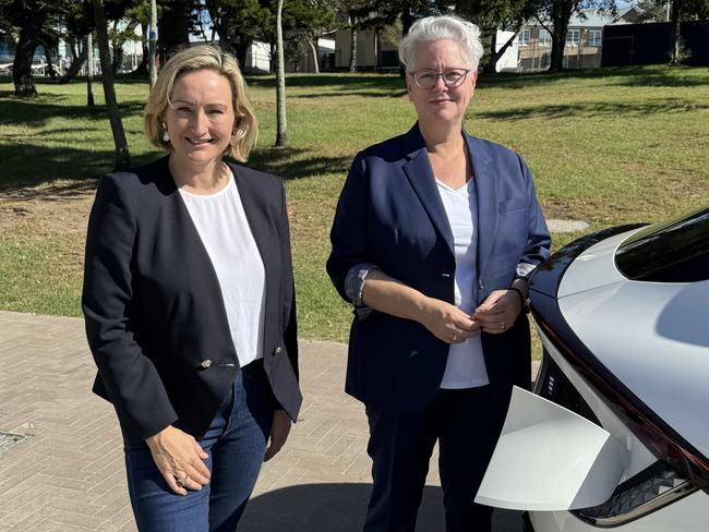 Coogee MP Marjorie O'Neill (left) and NSW Climate Change and Energy Minister Penny Sharpe with an EV.