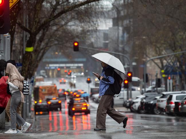 MELBOURNE AUSTRALIA - Newswire Photos JULY 9TH 2024 : Heavy rain hits Melbourne. PICTURE : Newswire / Nicki Connolly