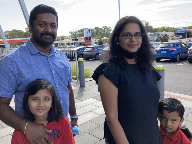 Tea Tree Gully voters Shiju and Deepthi Thoms with their children. Picture: Brinley Duggan