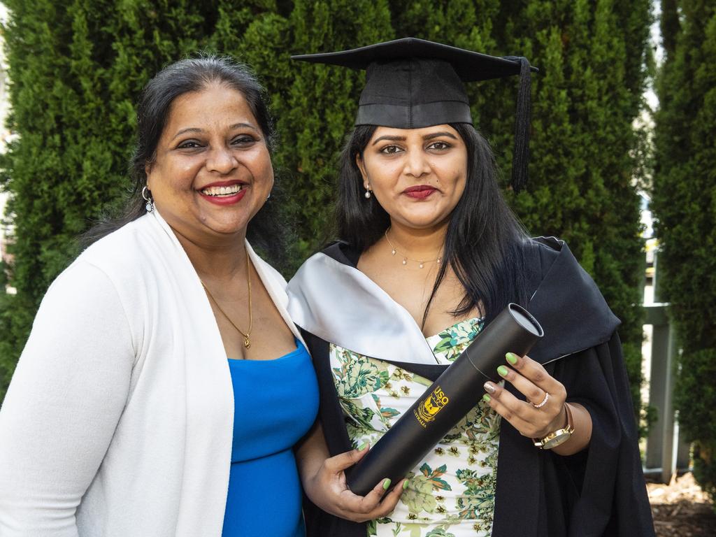 Graduate Diploma of Business graduate Darshna Sahay with Gauri Samant at the UniSQ graduation ceremony at Empire Theatres, Tuesday, December 13, 2022. Picture: Kevin Farmer