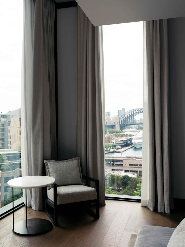 Views from some upper-level rooms, like this ninth-floor Liberty Suite, extend over Circular Quay towards Sydney Harbour Bridge. Picture: Felix Forest