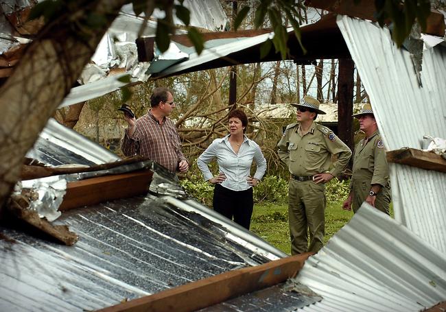 Chief Minister Clare Martin, Police Minister Paul Henderson, Police Commissioner Paul White and local cop Tony Martin inspect the damaged Maningrida High School in 2006. Picture: Patrina Malone