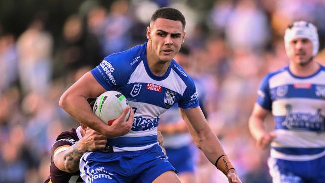 SYDNEY, AUSTRALIA - JULY 15: Jacob Kiraz of the Bulldogs is tackled during the round 20 NRL match between Canterbury Bulldogs and  Brisbane Broncos at Belmore Sports Ground on July 15, 2023 in Sydney, Australia. (Photo by Izhar Khan/Getty Images)