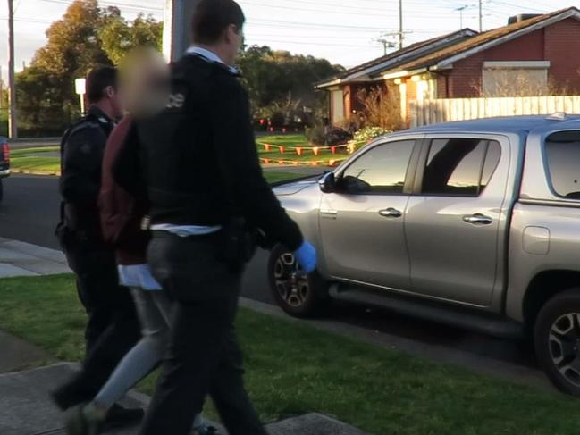 Detectives from the Echo Taskforce arrest a Dallas man. Picture: Victoria Police