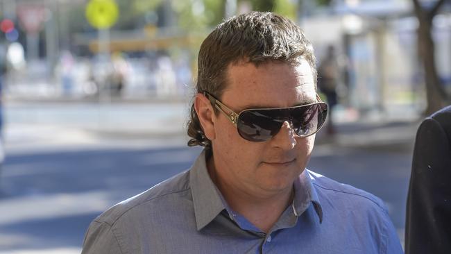 Benjamin McPartland is seen leaving Adelaide Supreme Court after he was put on an interim supervision order. Picture: Roy VanDerVegt