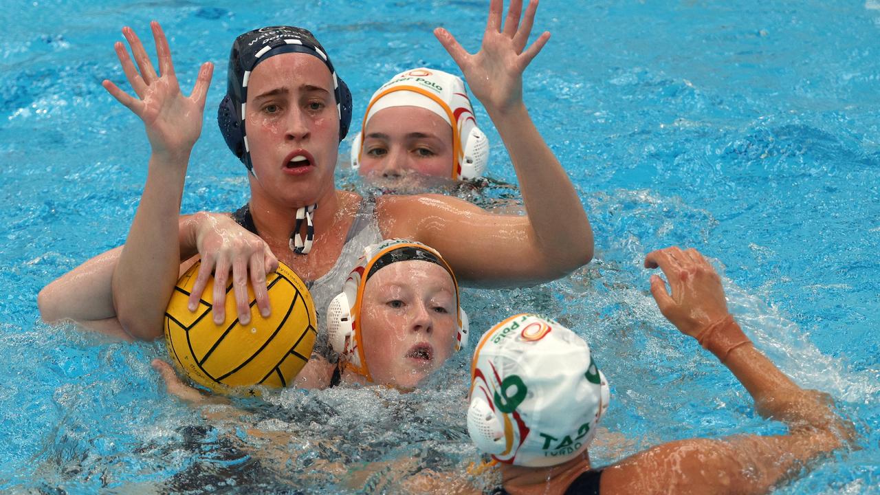 <p>Mimi Stoupas of Victoria under pressure from (top to bottom) Kate Poynter, Emme Doube-MacLeod and Alex Brown of ACT/Tasmania.</p>