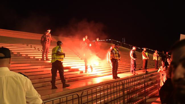 Flares were thrown on the forecourt of The Sydney Opera House in Sydney. Picture: NCA NewsWire / Jeremy Piper