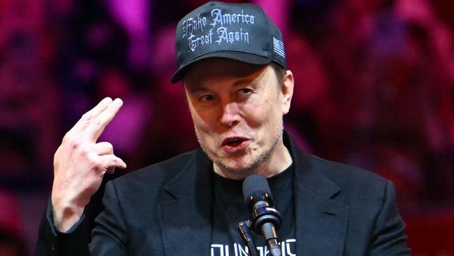 Tesla and SpaceX CEO Elon Musk speaks at a rally for Republican presidential candidate Donald Trump at Madison Square Garden in New York, October 27, 2024. (Photo by ANGELA WEISS / AFP)